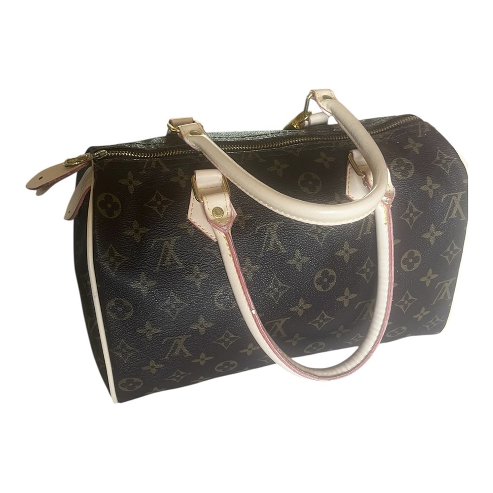 Louis Vuitton Speedy bag in monogram canvas with cream trim. - Picture 5 of 10